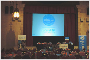 Stage podium for UNICEF conference at West Side Church